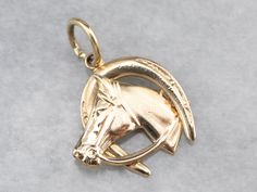 "A classic horseshoe of polished 14 karat gold is centered with a handsome steed in this gorgeous detailed pendant! This fantastic horse and good luck horseshoe is ready to wear or give as a gift to your favorite horse lover. This pendant does not come with the chain shown. Please feel free to contact us, we will help you find the perfect chain for your style and budget! Metal: 14K Yellow Gold Measures: 19 x 25 mm, with bail Marks: \"14K\" Stamped on the reverse SKU #: 9WVA7RT1 Each piece has be Good Luck Horseshoe, Horseshoe Pendant, Horse Jewelry, Horses Pendant, Cameo Ring, Gifts For Horse Lovers, Horse Lover