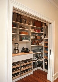 a computer screen showing a pantry with many items on the shelves and drawers in it