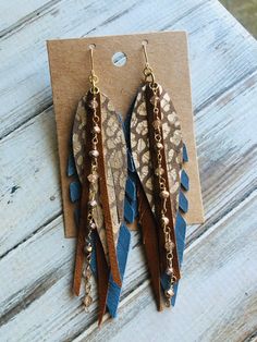 Denim blue rust brown leopard bead chain leather feather earring/boho leather dangle earring/long leather earring/feather beaded earring Boho shabby chic! Denim blue neutral tan leopard whisky brown fringe leather ,hand beaded crystal chain long feather dangle earrings with gold plated findings.Super light and ready to wear! Super statement earrings:) Hooks are lead and nickel free .Ready to sell will ship out same or next day in a gift box with tracking:) thanks for looking at my shop:) Diy Earrings Easy, Denim Earrings, Earring Long, Brown Fringe, Crafting Jewelry, Leather Earring, Beaded Earring, Handmade Jewelry Tutorials, Boho Leather