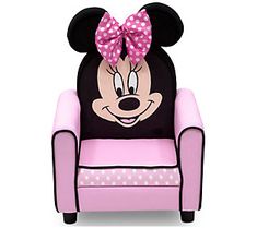 a minnie mouse chair with a pink bow on it's head and polka dots