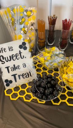 a table topped with lots of candy and candies