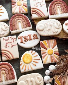 decorated cookies are arranged on a table