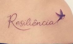 the word resilicia written in cursive writing on a woman's back