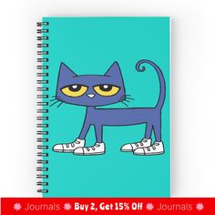 a spiral notebook with an image of a blue cat on the front and yellow eyes