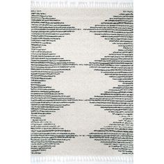 a white and black rug with fringes on the bottom, in front of a white background