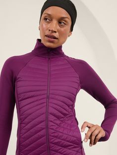 FOR: Medium to high-impact workouts at the gym, studio, or outdoors FEEL: Chafe-free seamless construction for maximum comfort FAVE: High collar adds extra warmth Thumbholes hold sleeves in place and keep warmth in Secure zip pockets to store your essentials Fitted next to the body High hip, sits at the high hip Body length in size medium: Regular 25 1/2", Petite 24", Tall 27", Plus/Size 2X 27 3/4". Winter Running Stretch Outerwear, Functional Winter Running Activewear, High Stretch Nylon Sports Outerwear, High Stretch Nylon Outerwear For Sports, Sports Nylon Outerwear With High Stretch, Winter Compression Sportswear Activewear, Winter Compression Activewear For Gym, Winter Compression Sportswear, Winter Compression Gym Activewear