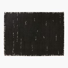 a black rug with white lines on the bottom and one line drawn across it, in front of a white background