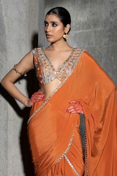 Saffron orange pre-draped saree with pleat detail and sequin embroidered border. Paired with mirror, sequin and thread embroidered blouse. - Aza Fashions Concept Saree, Saffron Orange, Pleated Saree, Indian Wedding Outfit, Drape Saree, Desi Clothes, Sharara Set, Indian Embroidery, Bridesmaid Outfit