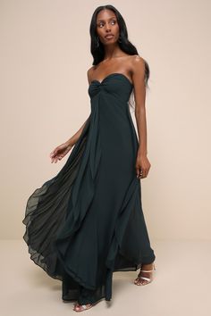 Effortlessly move through the evening in elegant fashion with the Lulus Intricate Perfection Emerald Green Strapless Ruffled Maxi Dress! Airy woven chiffon shapes the romantic dress that features a strapless, twist-front bodice (with hidden no-slip strips) and a flirty sweetheart neckline. The high, empire-style waist tops a flowy, A-line skirt adorned with cascading ruffle details that continue down to the sweeping maxi hem. Hidden back zipper/clasp. Fit: This garment fits true to size. Length: Floor length. Bust: Works best for A to C cup sizes. Waist: Fitted - very fitted at natural waist. Hip: Loosely Fitted. Undergarments: May be worn with a strapless bra, adhesive bra, petals, or no bra. Fabric: Fabric has no stretch. Lined. Shell: 100% Polyester. Lining: 100% Polyester. Hand Wash Co Ruffle Green Dress, Green Ruffled Maxi Dress For Prom, Green Strapless Maxi Dress For Prom, Formal Strapless Floor-length Dress With Ruffles, Green Floor-length Dress With Ruffles, Elegant Green Strapless Floor-length Dress, Emerald Bridesmaid Dress, Green Formal Dress, Emerald Green Prom Dress