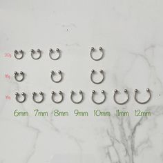 20g 18g 16g Horse Shoe Barbell Listing is for 1 piece of horseshoe Features: Material: High polished Surgical Steel Gauge: 20g 18g 16g Ball Size: 3mm Ready for a Gift 🎁 *All PIERCINGS ARE NOT REFUNDABLE DUE TO HYGIENE AND FOR YOUR SAFETY* Hypoallergenic Minimalist Curved Barbell Piercings, Minimalist Hypoallergenic Curved Barbell Piercings, Horseshoe Septum, Barbell Piercing, Plugs Earrings, Horse Shoe, Gauges Plugs, Helix, Septum Ring