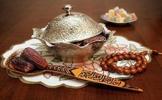 a bowl, spoon and other items on a table