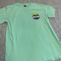 Maui And Sons Mens Mint Green Graphic Tee Shirt. 100% Cotton And Is New With Out Tags (Nwot). Regular Fit, Size Medium. Measurements: 18.5” Width (Pit To Pit, See Picture 7) And 27” Length (Collar Seam, See Picture 8). Like The Item But Not The Price? Make Me An Offer! :) Like More Than One Item In My Closet? Bundle For A Shipping Discount! Green Cotton Shirt For Streetwear, Green Short Sleeve Shirt With Logo Print, Green Logo Print Shirt For Summer, Green Logo Print Summer Shirt, Jaws Shirt, Green Graphic Tee, Shark Tee, Maui And Sons, Streetwear Shirts