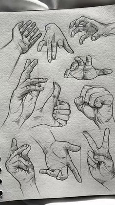 hand gestures drawn in pencil on paper