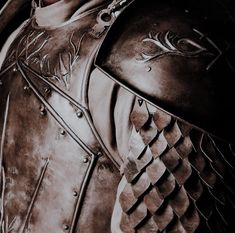 a close up of a man in armor