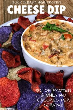 a white bowl filled with cheese dip surrounded by tortilla chips