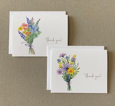 two thank you cards with watercolor flowers on them