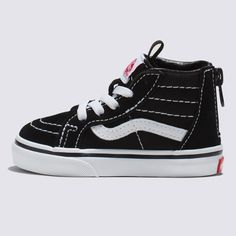 Our Legendary Sk8-Hi with Heel Zippers for Easy In And OutThe Sk8-Hi was a game changer as the first high-top skate shoe to break onto the scene in 1978. But the innovation didn’t stop there. Combining this legendary silhouette with a zipper entry at the heel for increased versatility, the Toddler Sk8-Hi Zip blends bold design with easy access for an iconic style like no other. Legendary high top, Sidestripe™ shoe made for toddlers Zipper entry at the heel Lace-up front closure Durable suede and Black Mid-top Canvas Shoes For Skateboarding, Vans High-top Skate Shoes With White Sole, Sporty High-top Skate Shoes, Vans High-top Skate Shoes, Vans High-top Canvas Shoes, Vans Skate Shoes For Skating, Vans Round Toe Skate Shoes, Vans Black Sneakers For Skating, High-top Canvas Shoes For Skateboarding