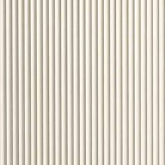 a white wall with vertical lines on it