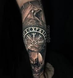 a man's arm with a clock and wolf on the cover up to it