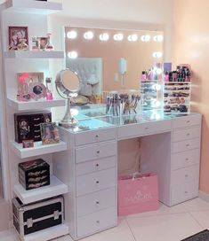 a white vanity with lots of makeup on it