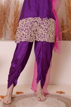 Purple kurta with floral cutwork embroidery on the neckline, sleeves and hem. Paired with a dhoti pant and a pink colour organza scallop embroidered dupatta. - Aza Fashions Traditional Drape Fitted Pants For Eid, Designer Traditional Drape Pants For Diwali, Bollywood Style Harem Salwar Kameez For Eid, Traditional Drape Pants For Navratri, Traditional Drape Bottoms With Dupatta For Eid, Bollywood Harem Salwar Kameez For Eid, Traditional Drape Pants For Navratri Festive, Festive Pants With Traditional Drape For Eid, Festive Pants For Eid With Traditional Drape