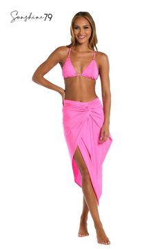 At once sexy and sophisticated, this pareo by Sunshine 79 is destined to become your go-to favorite of the season. Equally gorgeous paired with a one-piece suit as it is a bikini top and bottoms, this convertible sarong has a faux wrap design that creates gorgeous cascades of softly draping fabric. [split] Details Pareo cover-up Faux wrap design Lightweight fabric Fabric 83% Nylon, 17% Lycra Elastane Summer Party Beachwear Swim Skirt, Fitted Beachy Cover-up For Party, Party Beachwear With Tie-side Bottom, Pink Summer Party Cover-up, Fitted Beachy Party Cover-up, Fitted Pink Beach Cover-up, One-piece Cover-up For Beach Season, Chic Resort Season Beach Cover-up Swimwear, Fitted Vacation Cover-up For Party