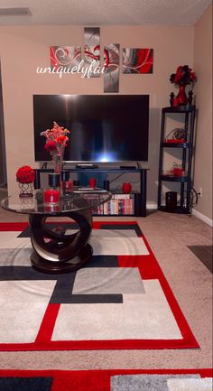 a living room filled with furniture and a flat screen tv on top of a wall