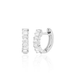 These diamond baguette huggie earrings are the perfect classic everyday huggie with a modern feel. Available in 14K White Gold, Yellow Gold, or Rose Gold Earring length = 10mm Diamond weight for the pair = 0.35 carats total Single = 1 individual earring Pair = set of two earrings Luxury Huggie Earrings With Prong Setting, Luxury White Baguette Cut Earrings, Luxury Yellow Gold Rectangular Huggie Earrings, Luxury Yellow Gold Linear Earrings With Prong Setting, White Gold Baguette Diamond Huggie Earrings, Classic Baguette Diamond Huggie Earrings For Anniversary, Baguette Diamond Huggie Earrings For Anniversary, White Gold Huggie Earrings With Baguette Diamonds, Formal Baguette Diamond Huggie Earrings