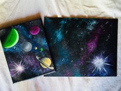 two canvases with planets and stars on them