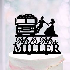 a wedding cake topper that says mr and mrs miller with a bus in the background