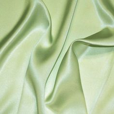 "Content100% Silk CompositionNatural Width45\" Weight (GSM)16.5MM OriginImported DESCRIPTION Silk Charmeuse possesses not only the finest aesthetics but retains the fluid sophistication most sought after in silk fabrics. It has a satin weave that allows the fabric to retain a soft feel and supple drape that high-end designers crave. Available in a variety of solids and prints, this fabric has many applications as it is composed of both a shiny face on one side and a matte face on the other. If y Vivienne Westwood Dress, Celery Green, Charmeuse Fabric, Vinyl Clothing, Muslin Fabric, Silk Charmeuse, Green Satin, Felt Fabric, Green Silk