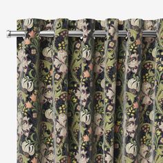 a curtain with floral designs on it