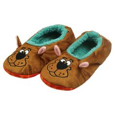 a pair of children's slippers with an image of a dog on it