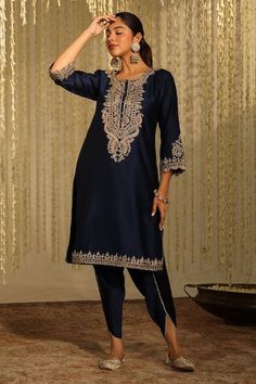 ✨ Embrace Elegance in Midnight Blue: Our Handmade Embroidered Zari Kurta and Dhoti Pant set in mesmerizing midnight blue exudes sophistication, making it the perfect choice for special occasions and celebrations. 🌟 Intricate Zari Embroidery: Adorned with meticulous handwoven Zari embroidery, this set showcases the timeless artistry and craftsmanship that adds a touch of glamour to your ensemble. 👗 Stylish Comfort: Designed for both style and comfort, the kurta drapes gracefully, flattering your silhouette, while the matching Dhoti pant adds a contemporary twist. Feel at ease and look effortlessly chic. 🎨 Rich Midnight Blue Hue: The deep and enchanting midnight blue hue adds a regal touch to your wardrobe, making this set a standout choice for evening events and festive gatherings. 🌿 Pr Kiran Dori Embroidery, Tulip Dhoti, Dhoti Salwar Suits, Blue Kurta, Ganesh Ji, Lawn Suit, Indian Party, Dhoti Pants, Cord Set