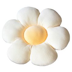 a white flower shaped object on a white background