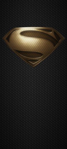 a gold superman symbol on a black and silver wallpaper with the word superman written across it