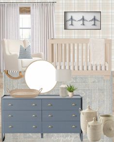 a baby's room with blue dresser, white crib and wall hangings