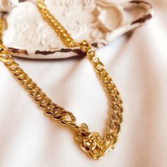 This stylish Cuban chain is super trendy at the moment, works for any street style you have in your closet!Item Details: • This listing is for ONE(1) Cuban chain necklace• 14k gold-filled, width 6mm.• Model wearing 16 inches. Trendy Gold-tone Tarnish Resistant Chain Necklace, Gold Cuban Link Chain Necklace As Gift, Trendy Yellow Gold Curb Chain Necklace, Trendy Curb Chain Necklace For Gift, Chic Gold Chain Necklace Tarnish Resistant, Chic Gold Chain Necklace For Gift, Trendy Gold Oval Link Necklace, Trendy Cuban Link Chain Necklace, Trendy Cuban Link Necklace With Adjustable Chain