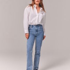 Ultra High Rise 90s Straight Jean On-Trend 90's-Style Ultra High Rise Straight Jeans With Built-In Stretch For Superior Comfort Featuring Our Highest Rise That Sits At Your Natural Waist And Looks Great With Your Shirt Tucked Or Untucked. With Refined Details And A Vintage Feel From Top To Bottom, This Style Features A Full Length Leg, Medium Marbled Wash And Frayed Hem. Imported. Body:99% Cotton, 1% Elastane To Avoid Color Transfer, Wash Before Wear, Turn Garment Inside Out Machine Wash Cold, W 90s Straight Jeans, Wishlist 2022, Blue Mom Jeans, High Rise Straight Jeans, Shirt Tucked In, Black Ripped Jeans, Love Jeans, Abercrombie And Fitch Jeans, High Rise Mom Jeans