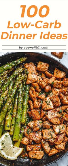 grilled chicken and asparagus in a skillet with lemon wedges on the side