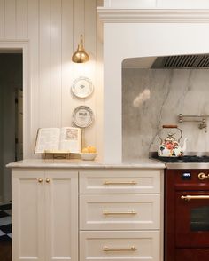 Project Tip: Spotlight areas in your kitchen where essential illumination is needed like your island, sink—or even to make your favorite cookbook easy to read. Design and photo by @annawpage #projectcollective #rejuvenationpartner Wood Floor Kitchen, Home On The Range, Classic Kitchen, Hardware Shop, Classic Kitchens, Shop The Look, House Inspo, Brass Hardware, Lighting Collections