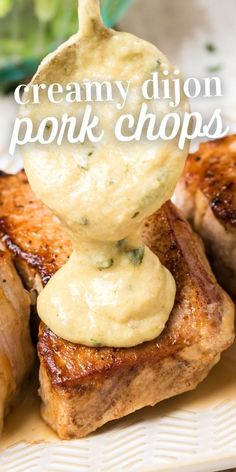 grilled pork chops with cream sauce on top and the words creamy dipon pork chops above it