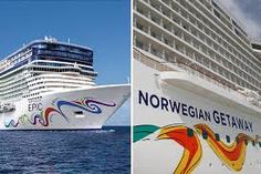 two cruise ships side by side in the ocean and one has a colorful logo on it