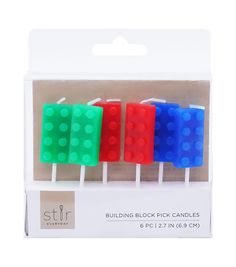 three building block candles are in a package