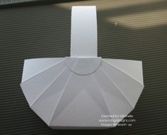 an origami piece is folded up and ready to be used as a decoration