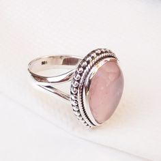 925 Sterling Silver Natural Rose quartz Ring, Pink Rose Quartz Ring, Handmade Stunning Ring, Pink Gemstone Ring, Fine Silver Ring. Product:- Ring Modal no:- U210 Metal:- 925 Sterling Silver Gemstone :- Rose Quartz Gemstone size:- 12x16 mm Finishing:- Shiny silver We are using Pure 925 (Stamped) Sterling Silver with Natural Gemstone Jewelry, all of our jewelry designs are Handmade. We are adding new creative designs in our store regularly, for new handmade stuff please get touch with our store. W Pink Moonstone Sterling Silver Ring For Anniversary, Silver Rose Quartz Crystal Ring, Pink Sterling Silver Moonstone Promise Ring, Elegant Pink Moonstone Sterling Silver Ring, Pink Rose Quartz Rings For Anniversary, Elegant Handmade Rose Quartz Rings, Pink Rose Quartz Anniversary Rings, Pink Gemstones Ring, Raw Gemstone Jewelry