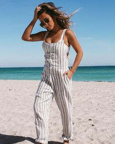 description Add some vacay vibes to your everyday style with the Sadie Jumper. Crafted from breezy fabric, this full-length jumpsuit features a flattering, slim straight leg, adjustable tie straps, front pockets, and a hidden zipper. Perfect for warmer days or as a stylish beach cover-up. info Full length jumper Pockets Tie straps Invisible zipper Slim straight leg Size XS-XL 85% viscose, 15% cotton Like all delicates, shape, color and fit are best preserved if hand washed in cold water. Lay fla