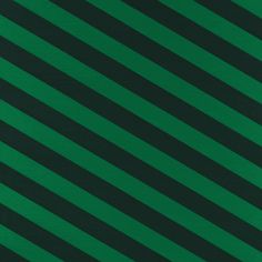 a green and black diagonal striped background