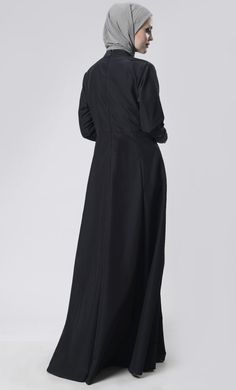 A perfect wardrobe piece for everyday/work Round neck Side pockets Front with box pleats & panel Embroidered abaya Full Sleeves FABRIC: Kashibo CARE: Machine wash cold Long Abaya With Pockets, Modest Fitted Black Abaya, Solid Color Abaya With Modesty Panel For Eid, Eid Abaya With Modesty Panel In Solid Color, Modest Abaya With Modesty Panel, Formal Long Solid Abaya, Long Abaya With Modesty Panel, Long Sleeve Abaya For Work, Solid Color Long Sleeve Abaya For Work