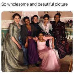 a group of women in dresses posing for a photo with the caption, so wholosme and beautiful picture?